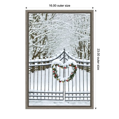 Christmas Wreath and Snow Covered Gate Framed Canvas Print