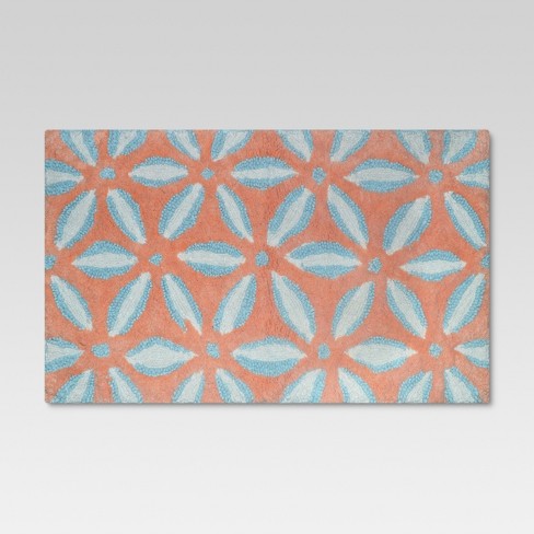 coral and light blue rug