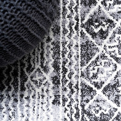 Ivory and Black Geometric Synthetic 8' x 10' Area Rug