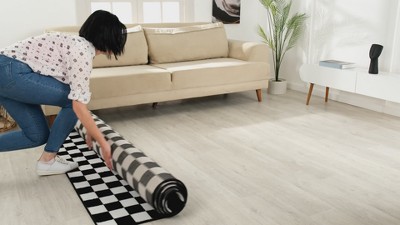 Gray and White Geometric Checkered 6' x 9' Synthetic Area Rug