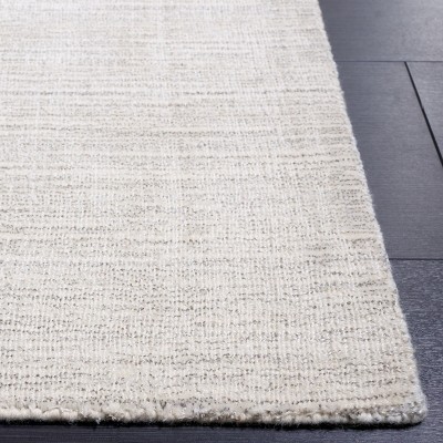 Ivory Hand-Knotted Wool and Viscose 6' x 9' Area Rug