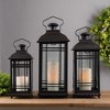 Black Metal Lantern Set of Three with Glass Panels 20in 17in and 14in Decorative Accent By Melrose - 3 of 3