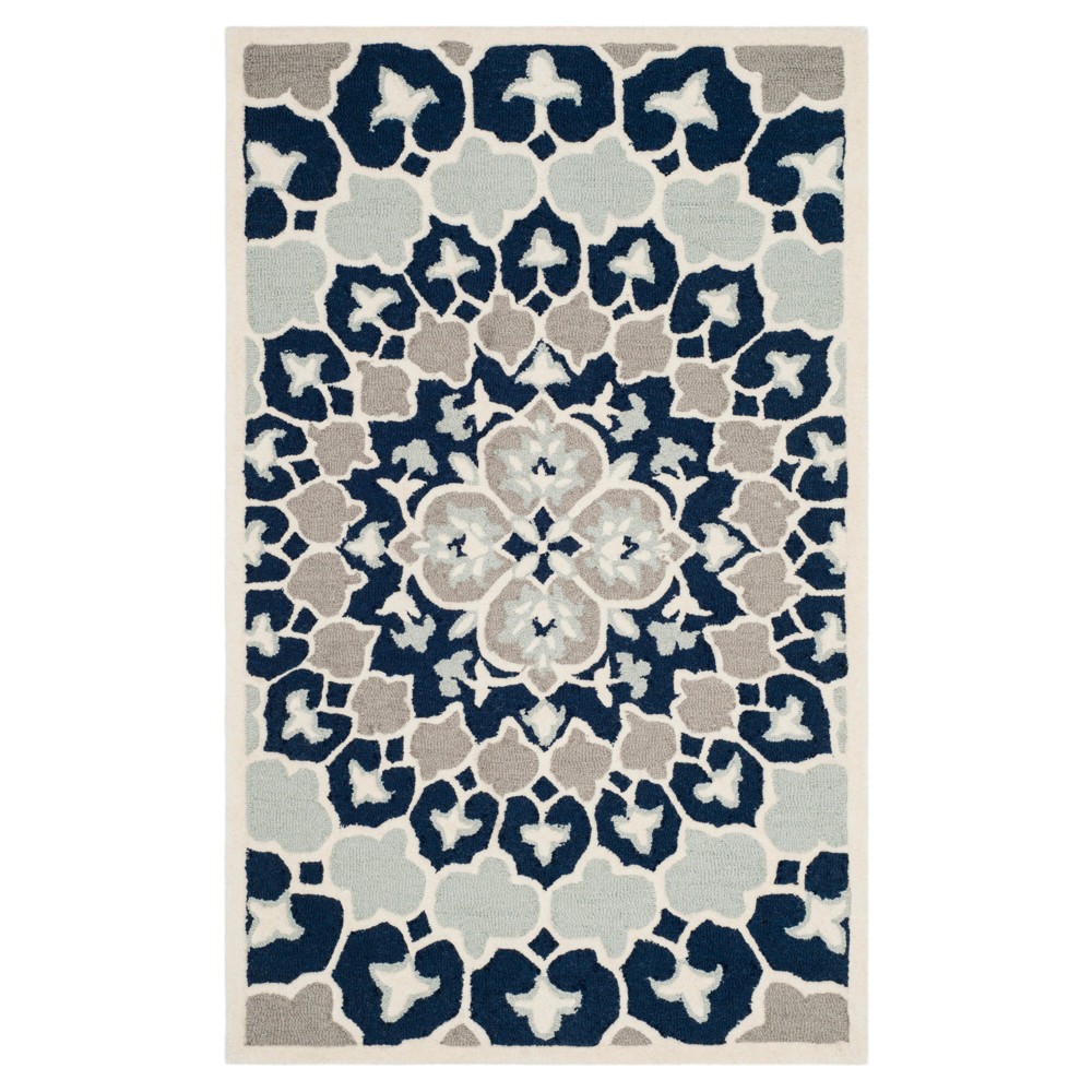 Navy Blue/Ivory Medallion Tufted Accent Rug 3'x5' - Safavieh