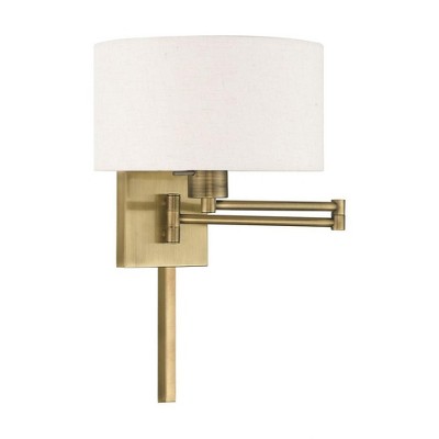 Antique Brass Swing Arm Wall Lamp with Oatmeal Shade