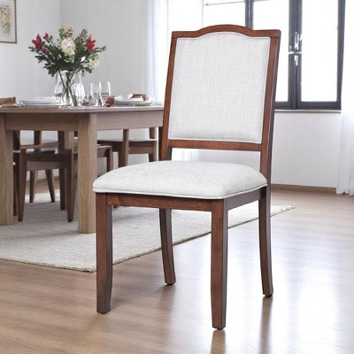 Angled view of upholstered dining chair in dining room
