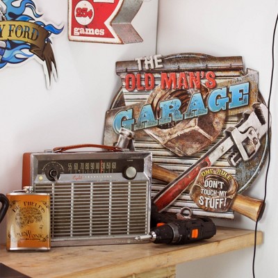 Vintage Metal Garage Sign with Tools and Bold Lettering