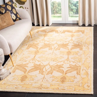 Elegant Ivory & Gold Hand-Tufted Wool Area Rug - 5' x 8'