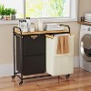 100L Metal laundry basket rack with wheels, paired with two laundry basket combinations - 2 of 4