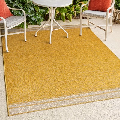 Alda Modern Minimalist Mingled Solid Indoor/Outdoor Area Rug - JONATHAN Y