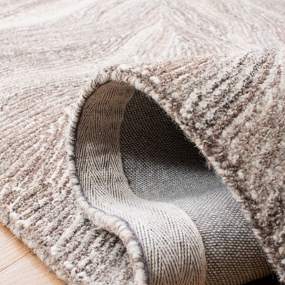 Ivory and Brown Hand-Tufted Wool 6' x 9' Area Rug