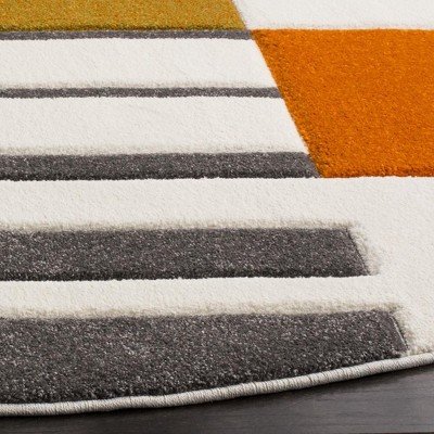 Ivory and Peacock Blue Geometric Mid-Century Modern Area Rug