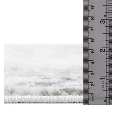 Elegant Gray Tufted Synthetic Area Rug for Indoor Use