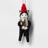 Felted Wool Tuxedo Cat Wearing Hat Holding Holly Christmas Tree Ornament Black/White/Red - Wondershop™