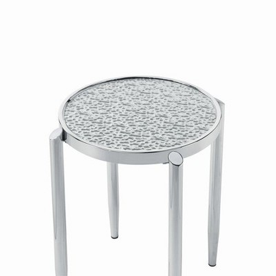 Round glass top end table with textured surface