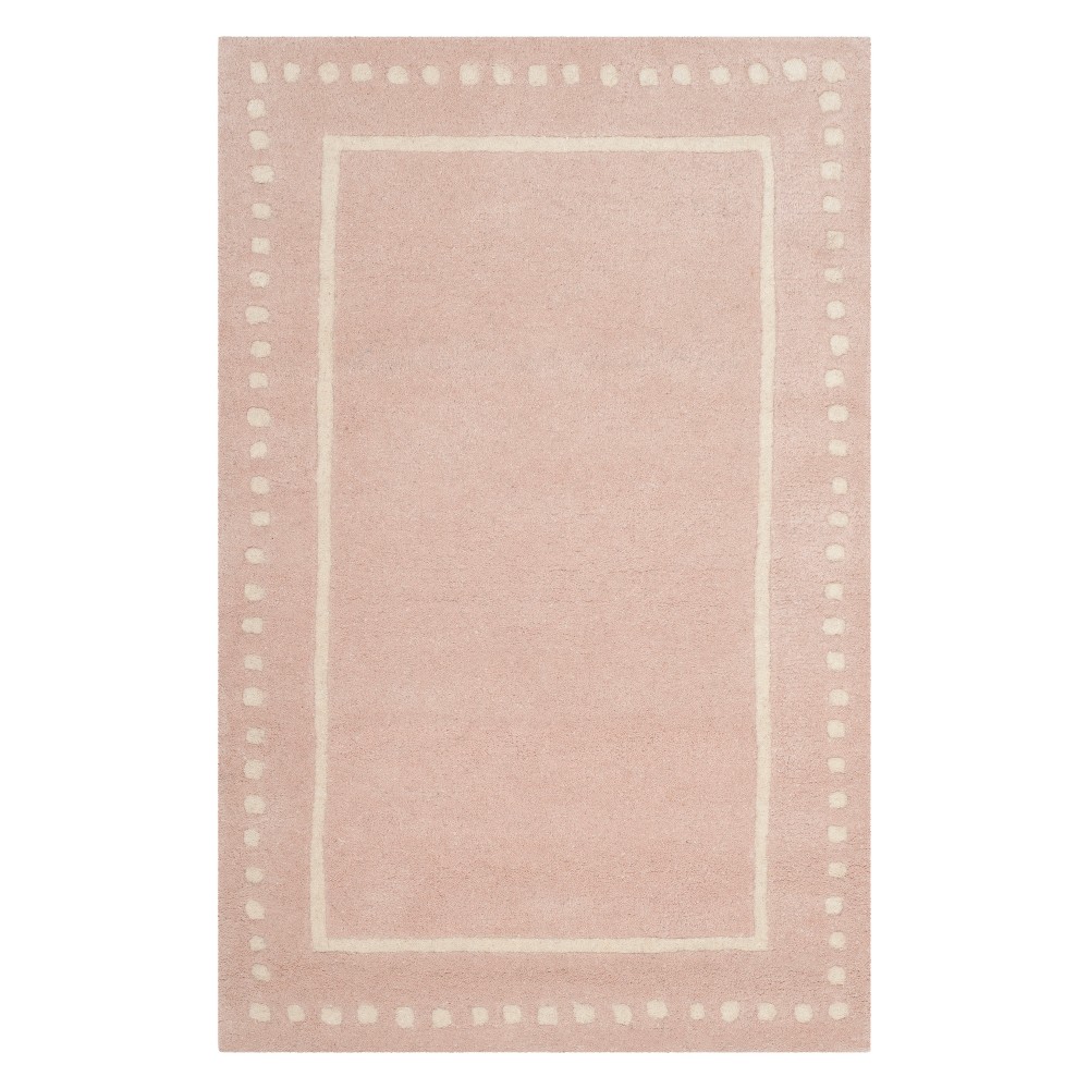 2'6inx4' Solid Accent Rug Light Pink/Ivory - Safavieh