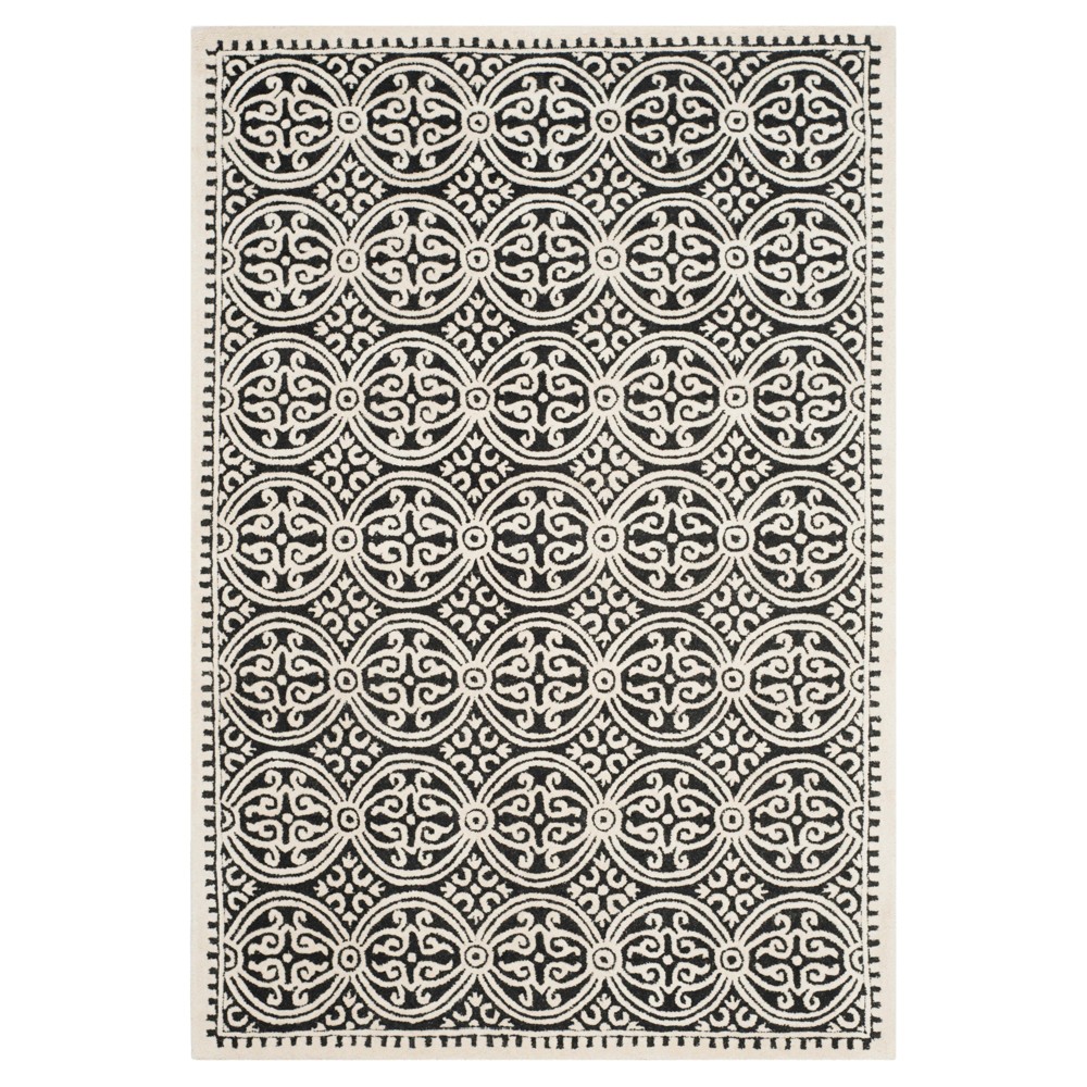Black/Ivory Geometric Tufted Area Rug 6'X9' - Safavieh
