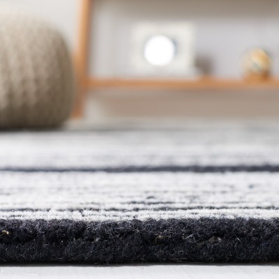 Elegant Metro Hand-Tufted Black Wool Area Rug 8' x 10'