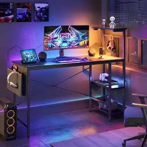 Bestier 51" Gaming Desk with LED Lights, Computer Desk with 4 Tiers, Reversible Shelves, Side Storage Bag, and Adjustable Shelf ,Black - 1 of 4