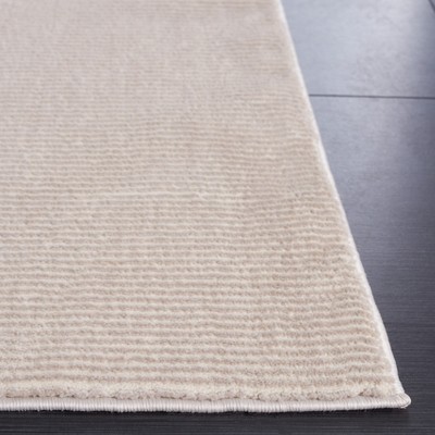Elegant Beige Synthetic 31'' Rectangular Easy-Care Area Rug