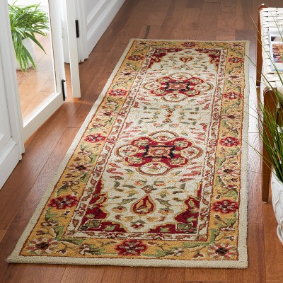 Hand Hooked Cream and Red Synthetic Runner Rug - 2'6" x 10'