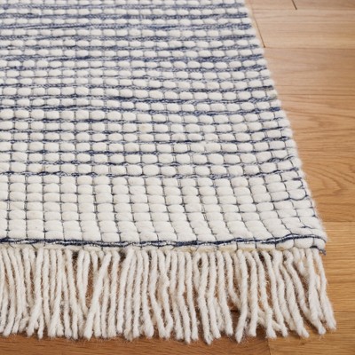Ivory and Navy Hand Woven Wool 5'x8' Area Rug