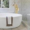 Cobbe Brushed Gold Floor Standing Tub Faucet Single Handle Freestanding Tub Filler with Swivel Spout Hand Shower and 59-Inch Hose - 2 of 4