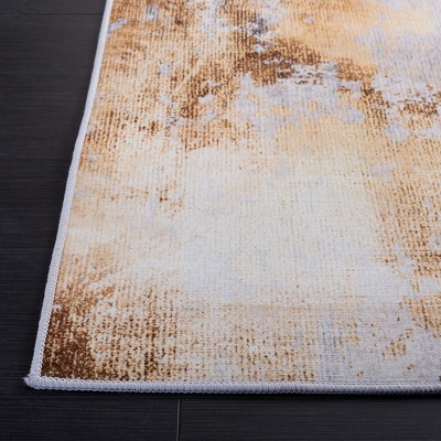 Tacoma 4' x 6' Gray and Gold Synthetic Area Rug