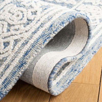 Blue and Ivory Hand-Tufted Wool Area Rug 5' x 8'