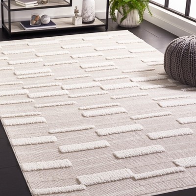 Ivory Geometric 9' x 12' Synthetic Easy Care Area Rug