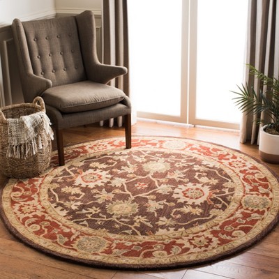 Handmade Round Olive and Rust Wool Tufted Area Rug