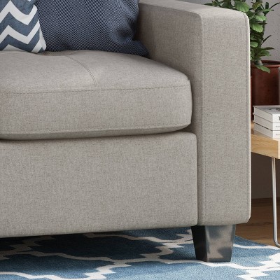 Beige Tufted Fabric Sofa with Natural Wood Legs and Sloped Arms
