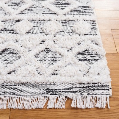 Augustine Black and Ivory Synthetic Flat Woven 8' x 10' Area Rug