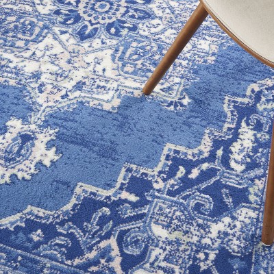 Navy Floral 6' x 9' Synthetic Rectangular Area Rug