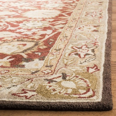 Handmade Rust and Green Wool Rectangular Area Rug 9'6" x 13'6"