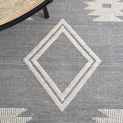 Marbella Black and Ivory Flat Woven Wool Area Rug