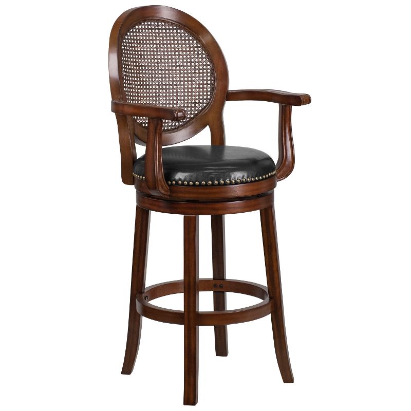 Merrick Lane 30" Swivel Bar Stool with Oval Rattan Back, Arms and Black Faux Leather Upholstered Swivel Seat in Espresso, 1 of 10