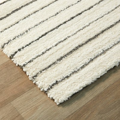 White Geometric Polyester and Polypropylene Area Rug