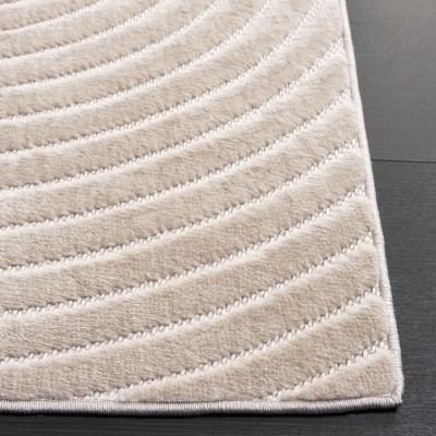 Ivory Abstract 4' x 6' Stain-Resistant Synthetic Rug