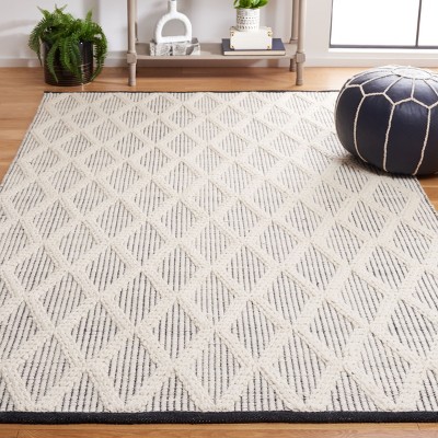 Handmade Black and Ivory Wool Diamond 6' x 9' Area Rug