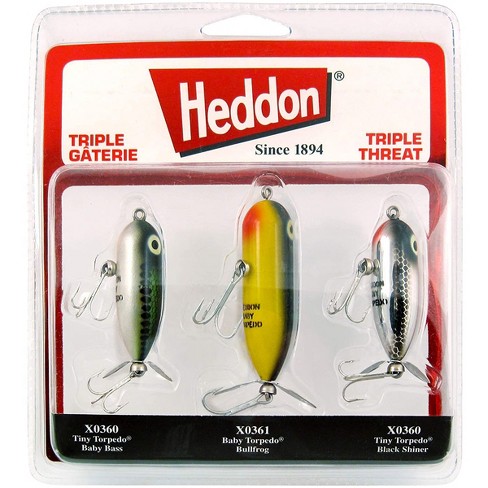 Nine Heddon wood fishing lures, to include three Torpedo's, two