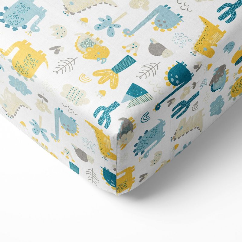 Bacati - Little Dino Boys Teal/Yellow Muslin 100 percent Cotton Muslin Universal Baby US Standard Crib or Toddler Bed Fitted Sheet, 1 of 6