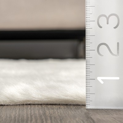 EcoChic Off-White Faux Cowhide 5' x 7' Easy-Care Area Rug