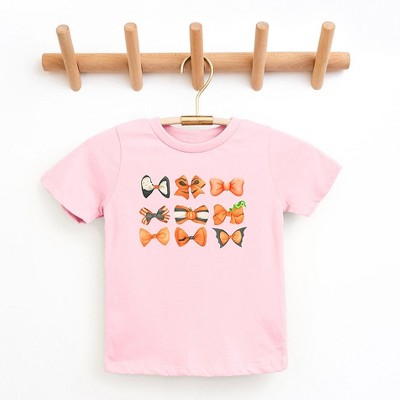 The Juniper Shop Coquette Girl Halloween Bow Chart Toddler Short Sleeve Tee