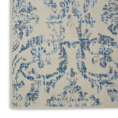 Elegant Ivory and Blue Damask 7' x 10' Synthetic Area Rug
