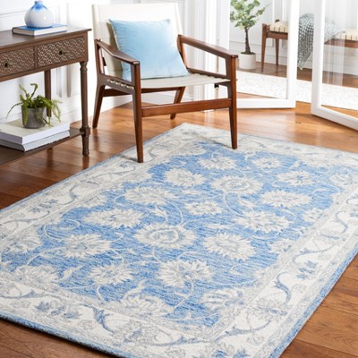 Handmade Blue and Ivory Wool 4'x6' Area Rug