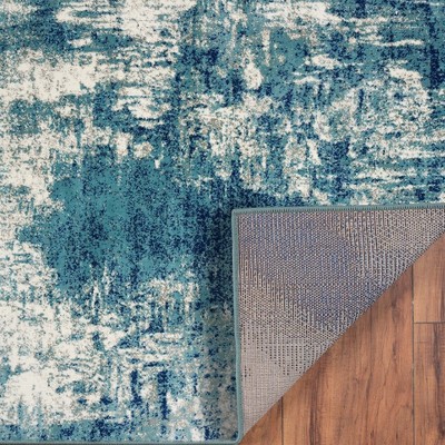 Light Blue Abstract 8' x 10' Stain-Resistant Synthetic Rug