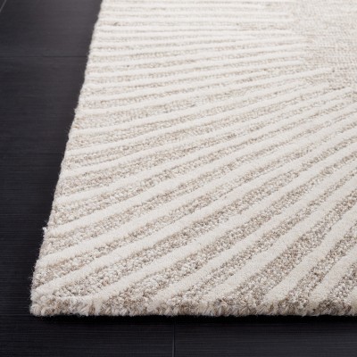 Natural Ivory Abstract Handmade Wool Tufted 4' x 6' Rug
