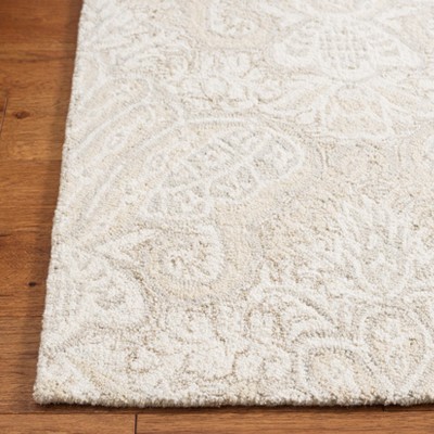 Elegant Ivory Wool Hand-Tufted 4' x 6' Area Rug