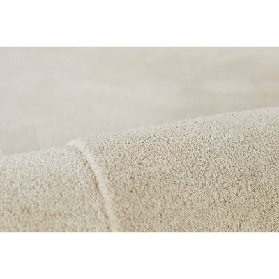 Ivory Kidney-Shaped Handmade Wool Area Rug, 6' x 9'