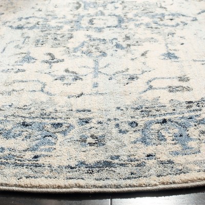 Ivory and Navy 8' x 10' Synthetic Oriental Area Rug